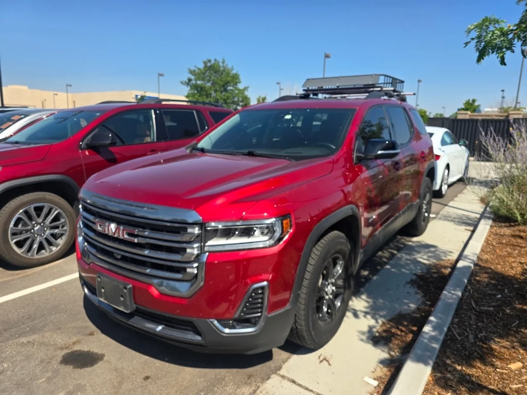 Used 2023 Volcanic Red Tintcoat GMC AT4 image 1