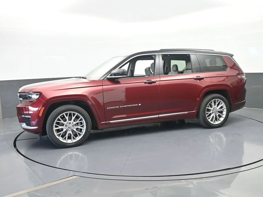 Used 2023 Velvet Red Pearlcoat Jeep Summit image 1
