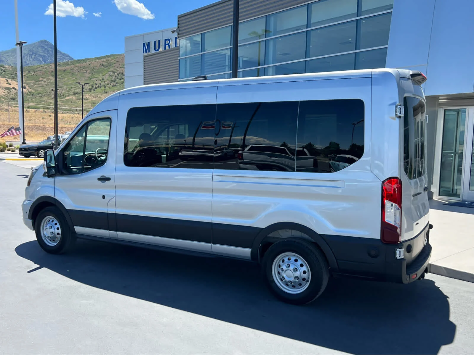 New 2026 Ingot Silver Metallic Ford Passenger Van XLT image 11