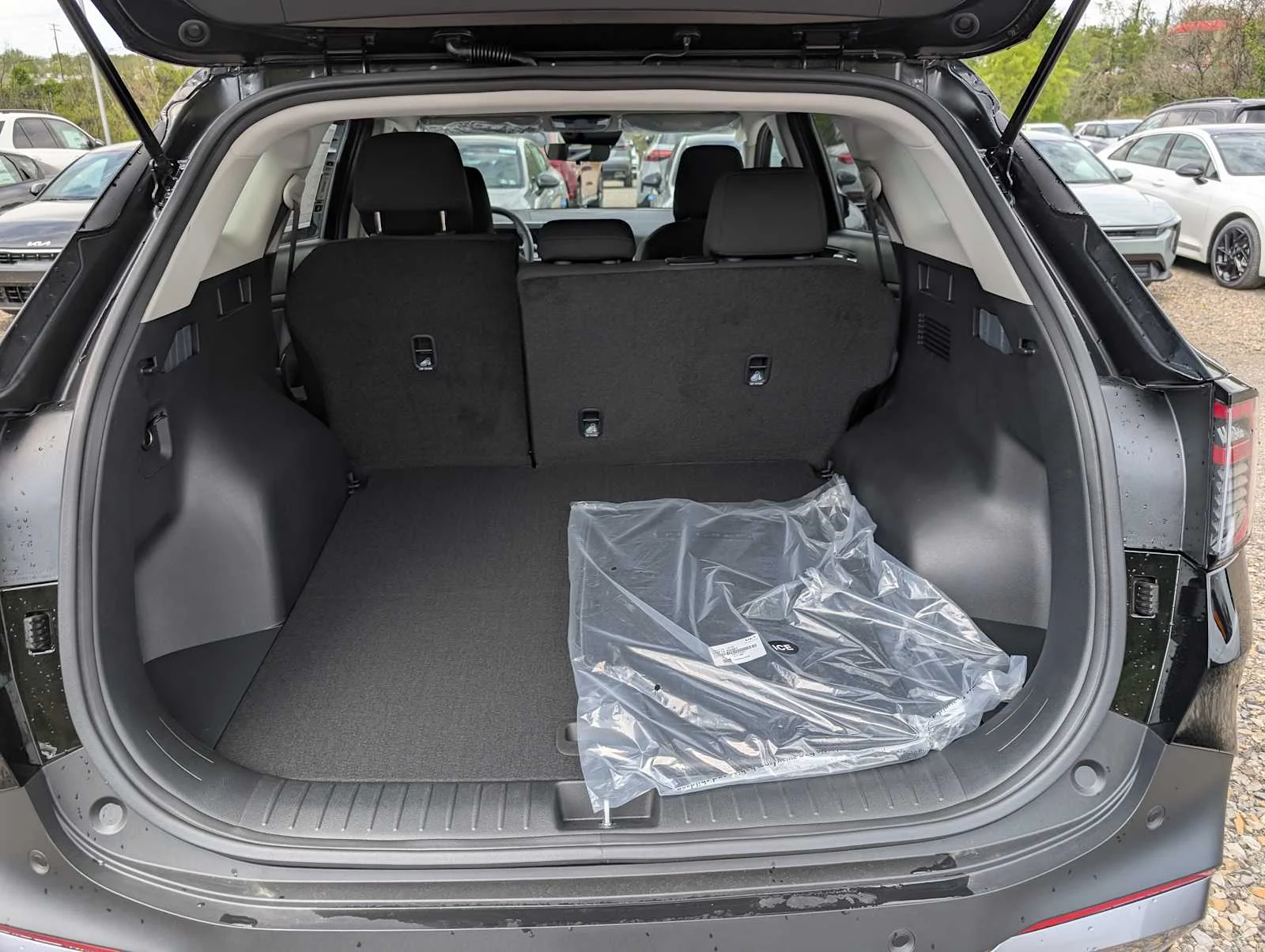 New 2026 Ebony Black Kia LX image 7