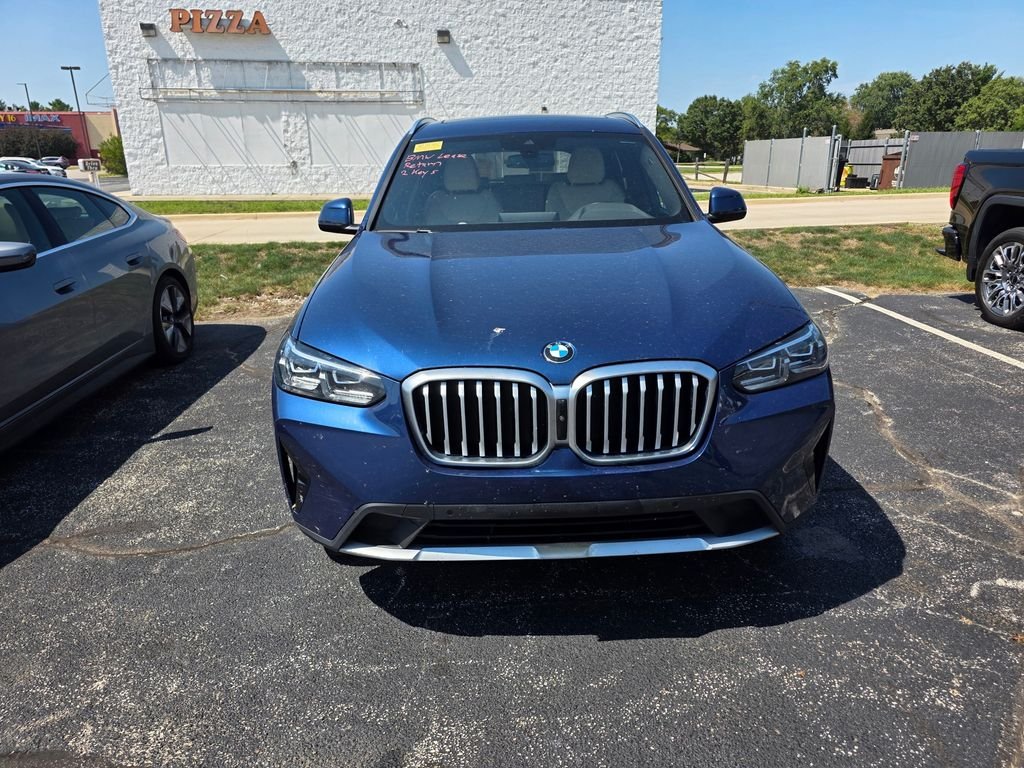 Used 2024 Phytonic Blue Metallic BMW xDrive30i image 1