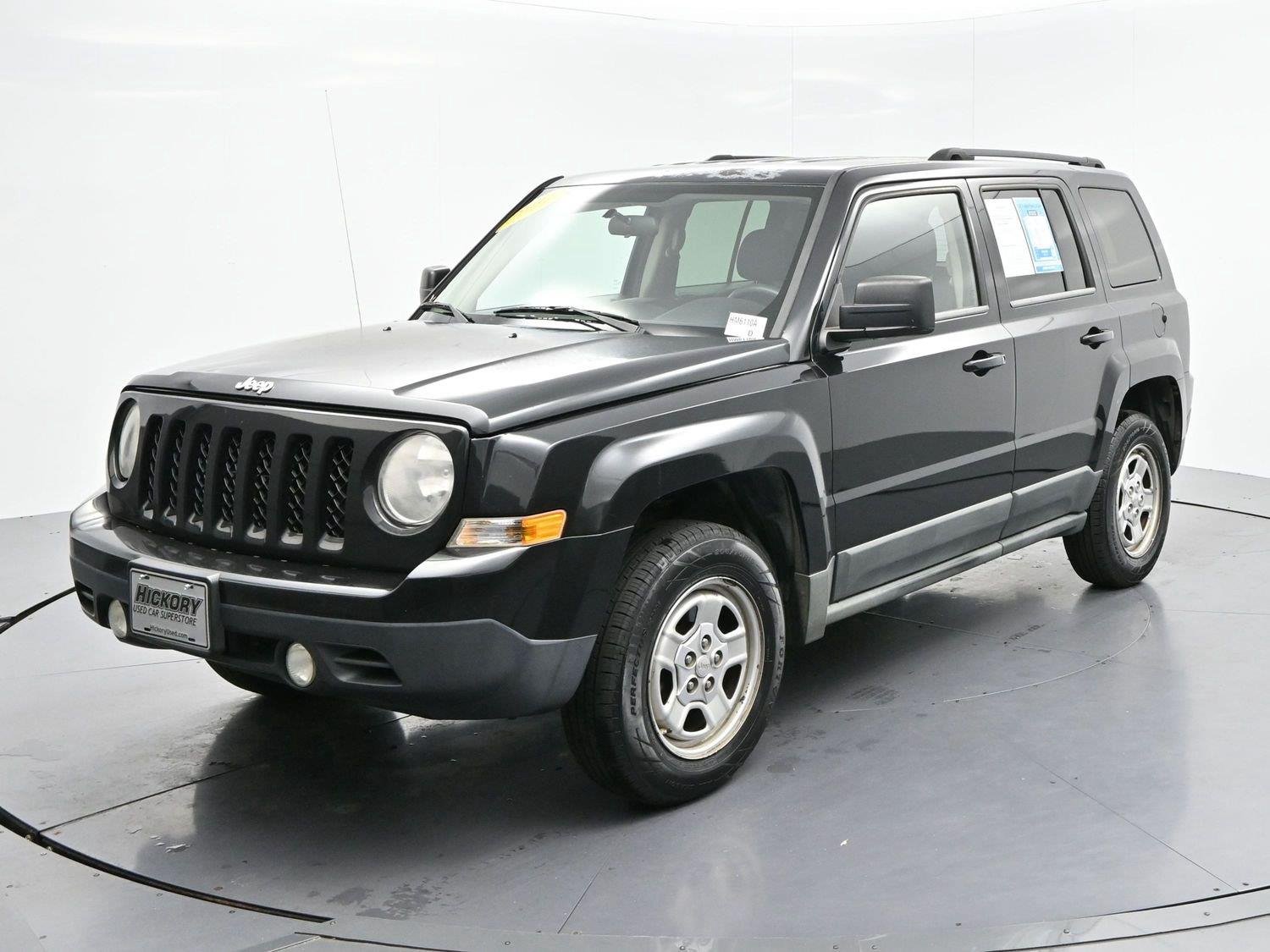 Used 2011 Brilliant Black Crystal Pearl Jeep Sport image 3