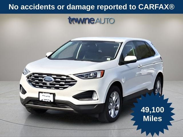 Used 2022 White Ford Titanium image 1