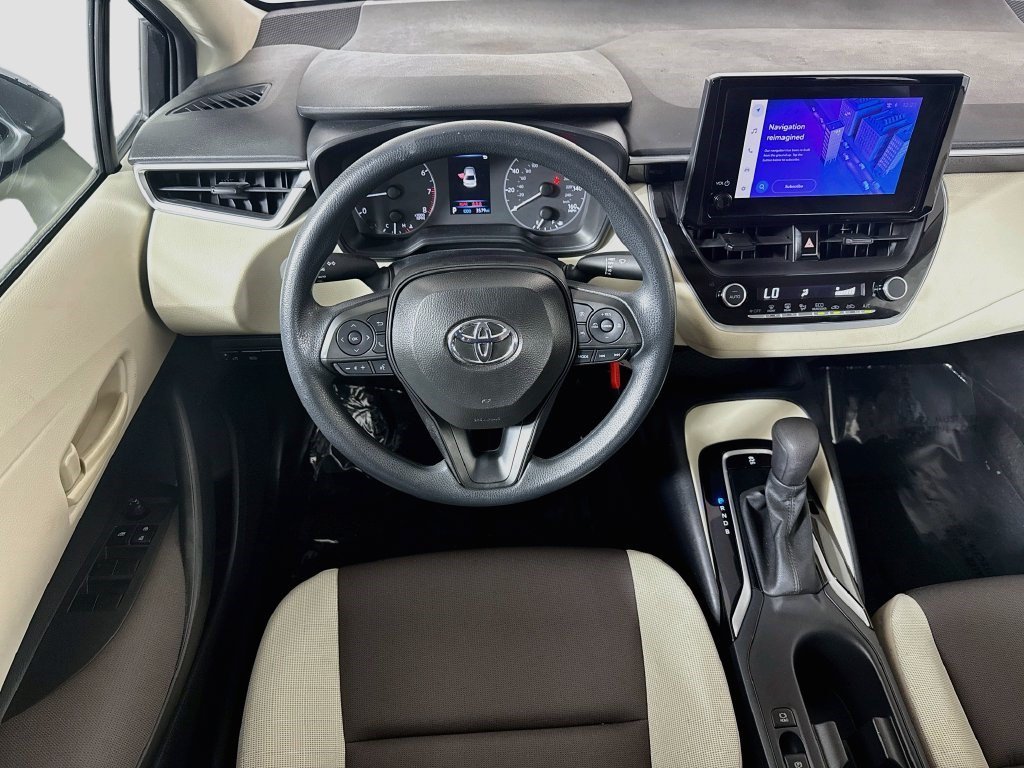 Used 2023 Midnight Black Metallic Toyota LE image 13