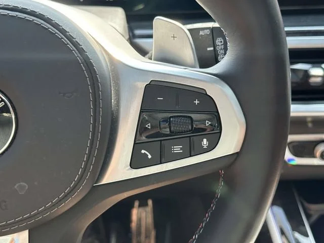 Certified Used 2025 Mineral White BMW M60i image 34