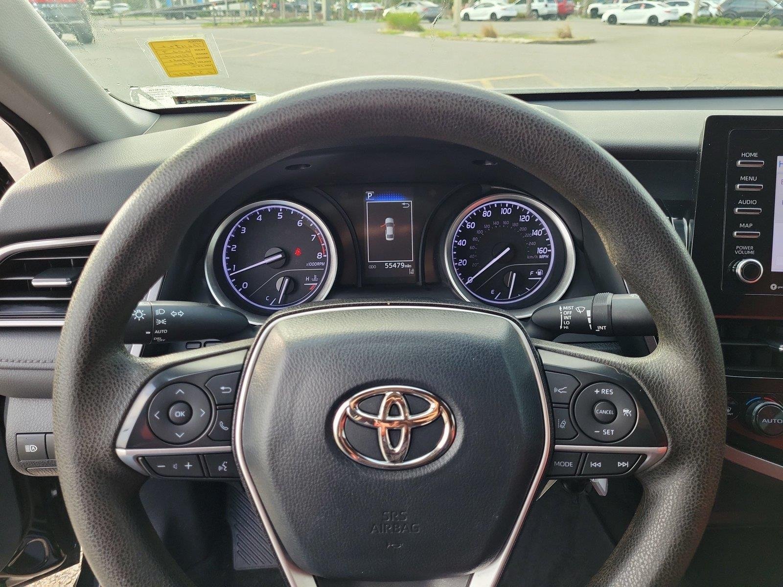Used 2023 Midnight Black Metallic Toyota LE image 24