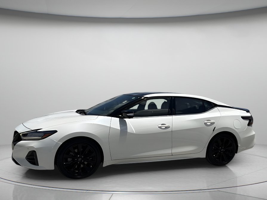 Used 2023 Pearl White Tricoat Nissan SR image 1