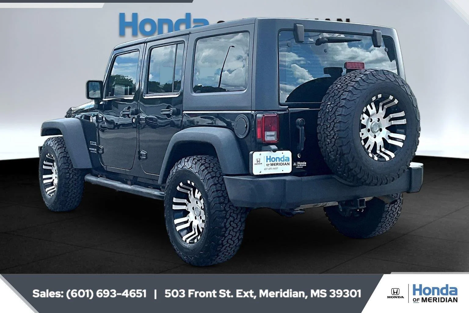 Used 2016 Black Clearcoat Jeep Sport image 2