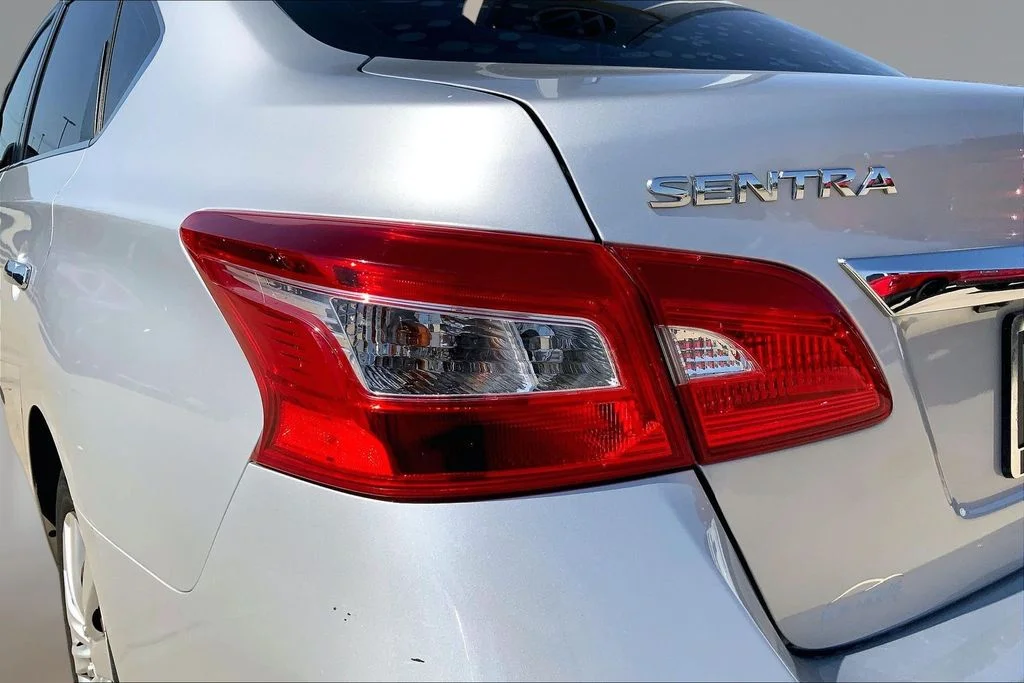 Used 2018 Brilliant Silver Metallic Nissan S image 28