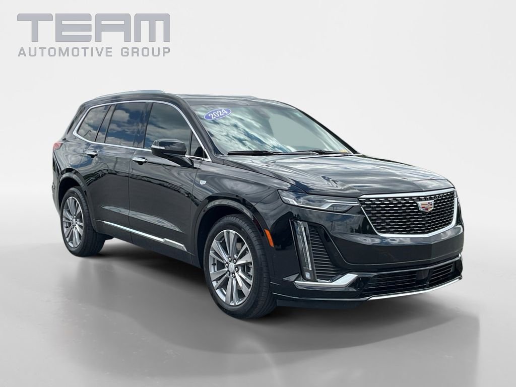 Used 2024 Black Cadillac Premium Luxury image 1