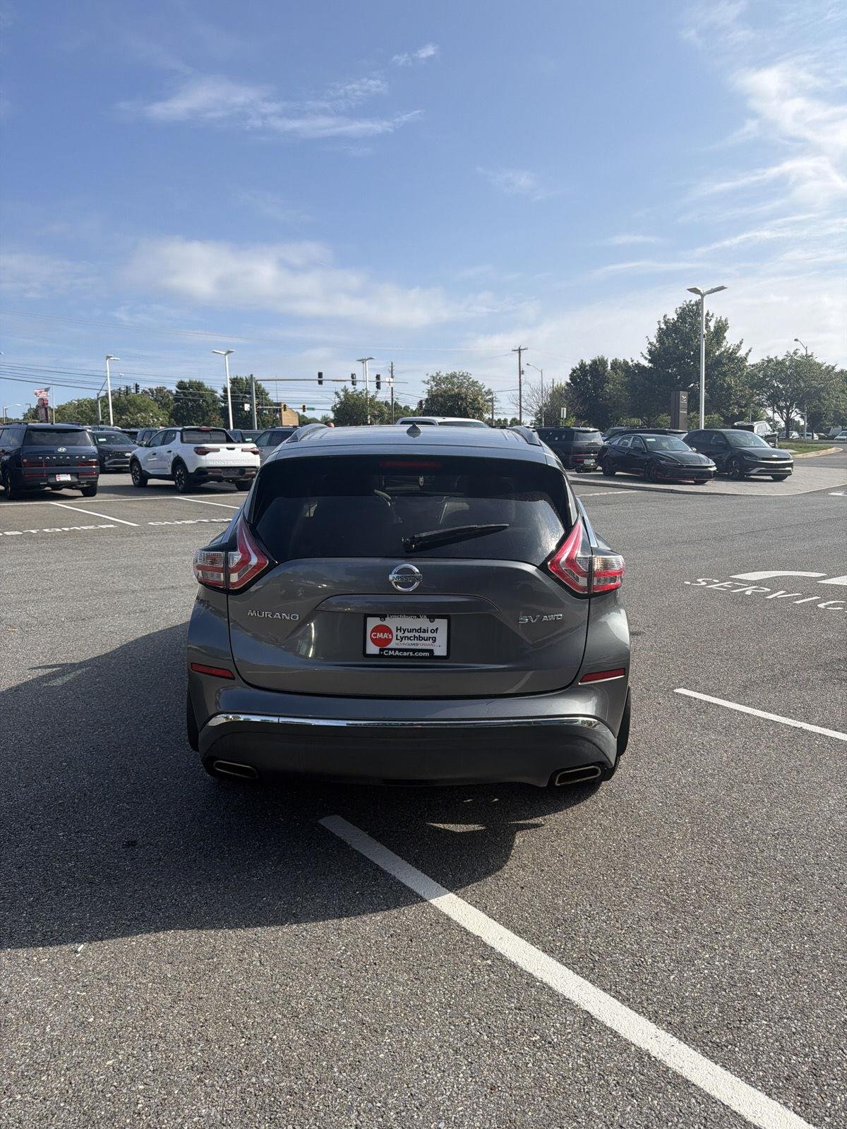 Used 2016 Gun Metallic Nissan SV image 9