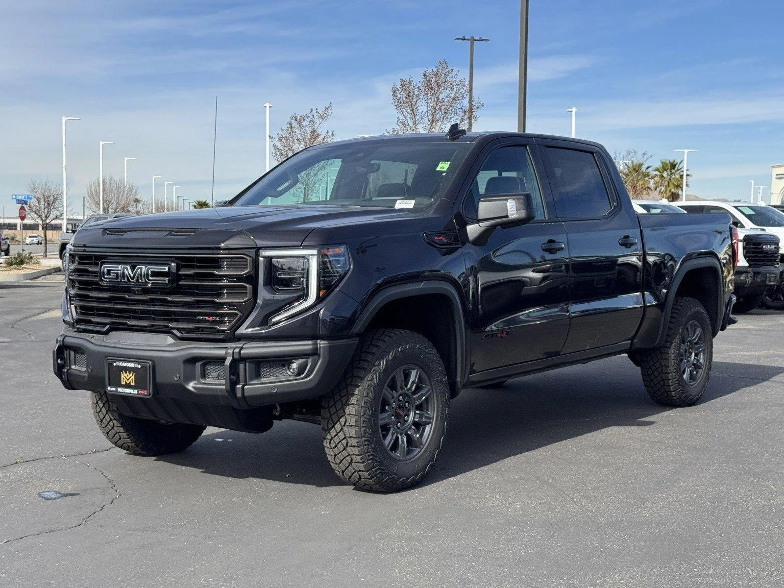 New 2026 TITANIUM RUSH METALLIC GMC AT4X image 3
