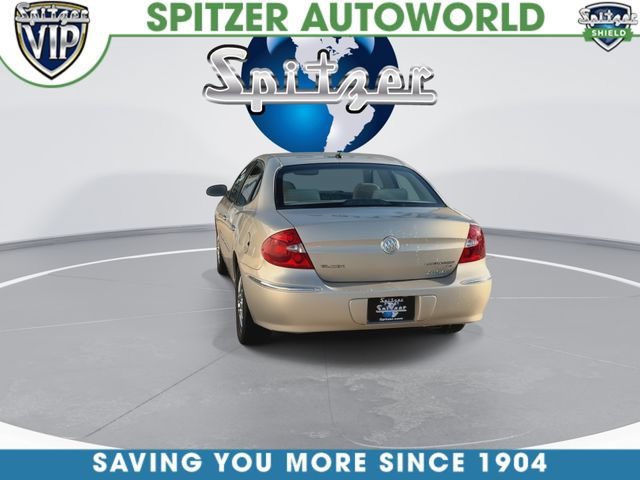 Used 2009 GOLD MIST METALLIC Buick CX image 8