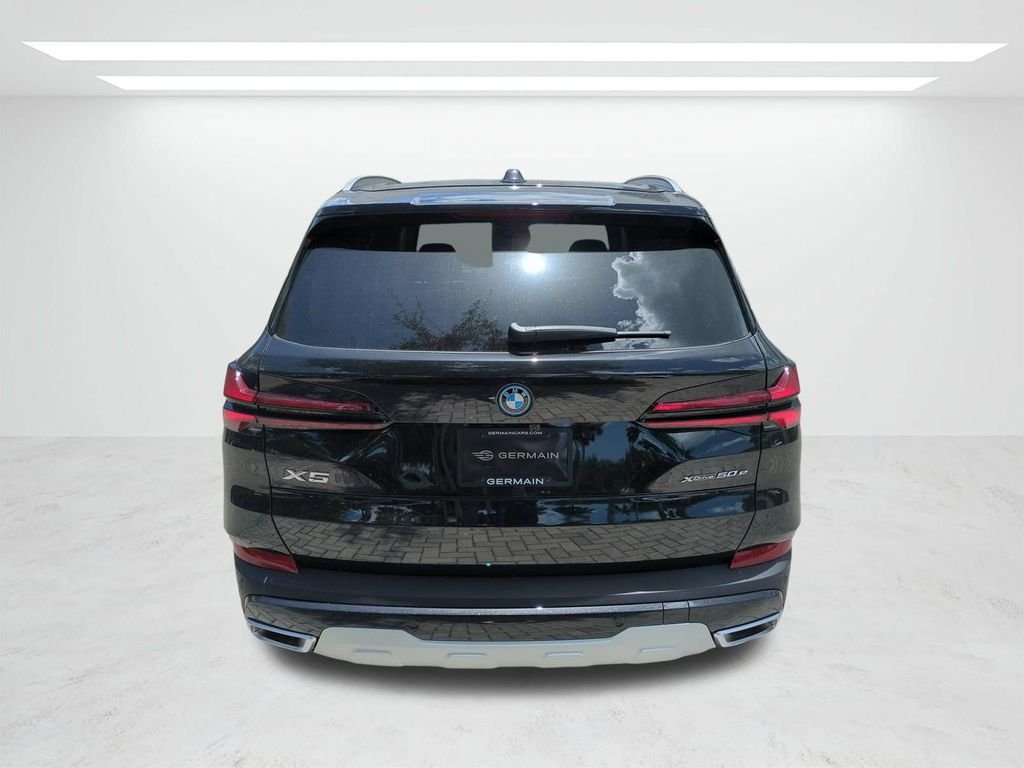 New 2026 Black Sapphire Metallic BMW xDrive50e image 5