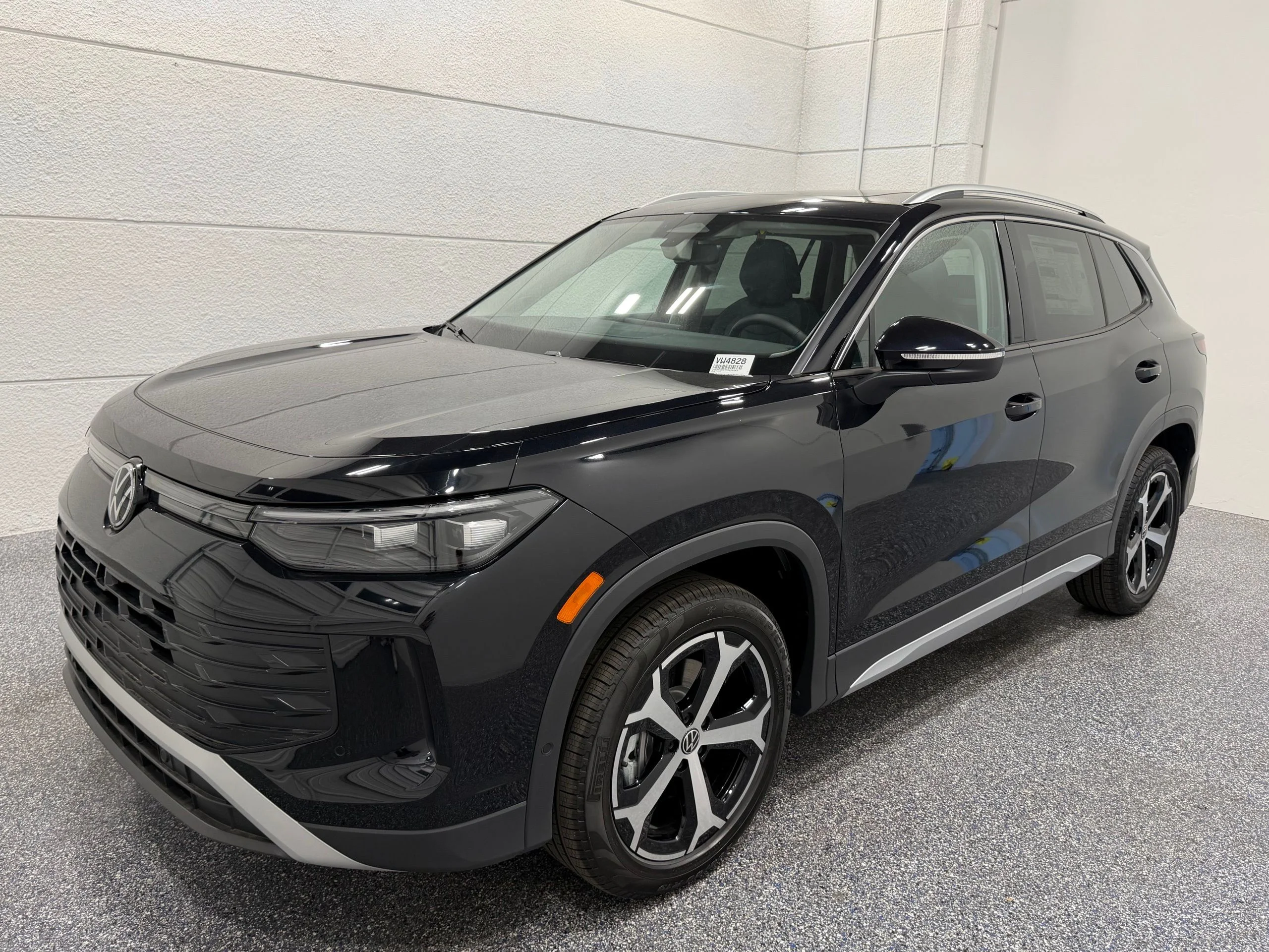 New 2026 Black Volkswagen SE image 1