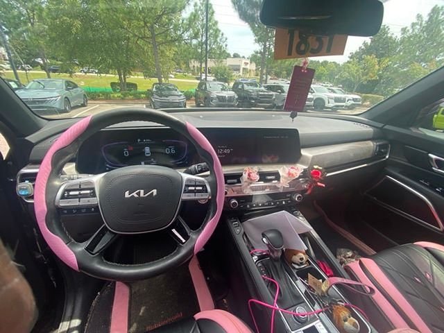 Used 2025 Black Kia EX X-Line image 3