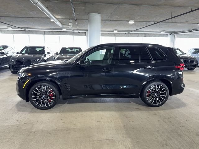 New 2026 Black Sapphire Metallic BMW xDrive50e image 4
