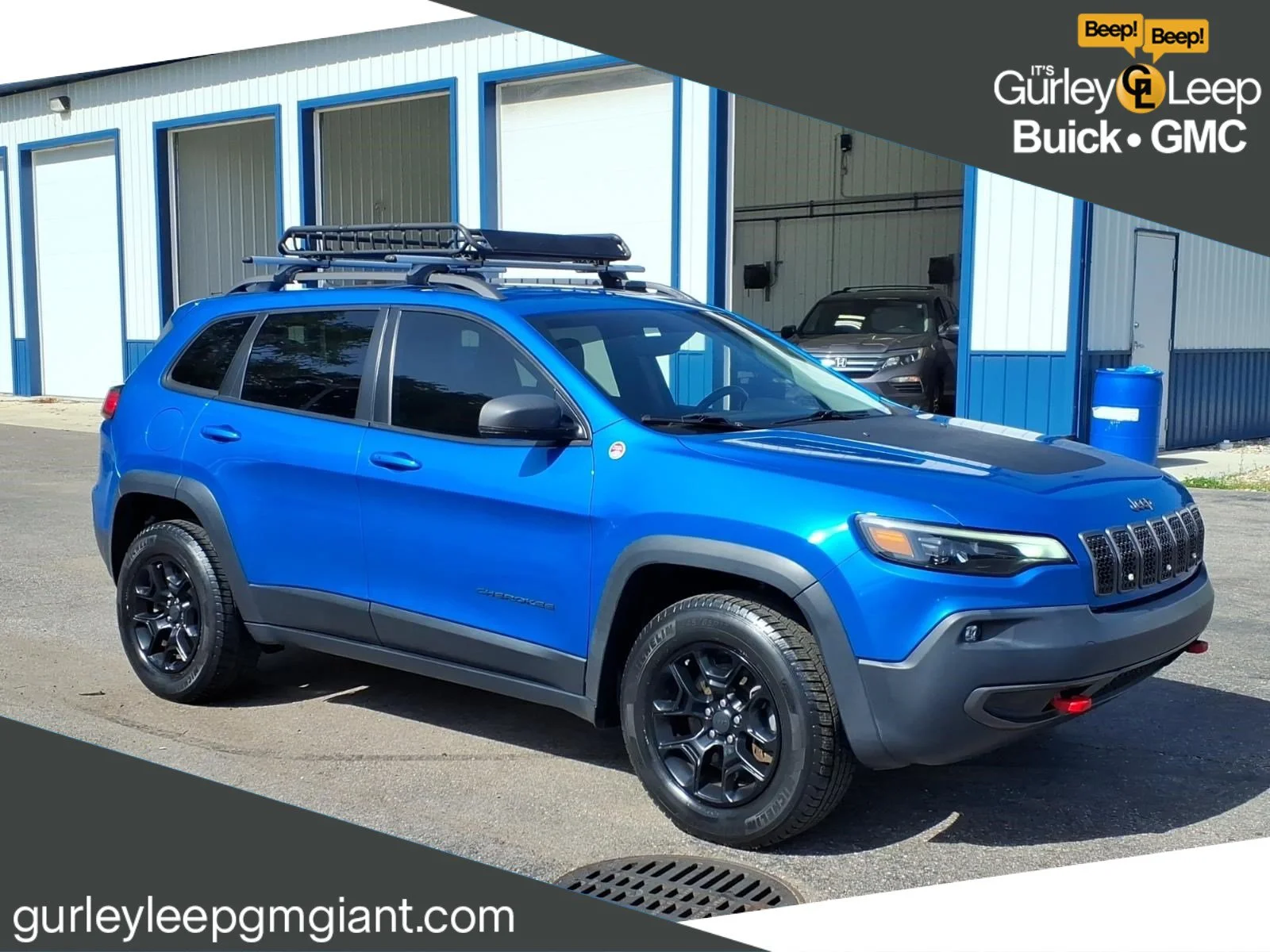 Used 2019 Hydro Blue Pearlcoat Jeep Trailhawk image 1