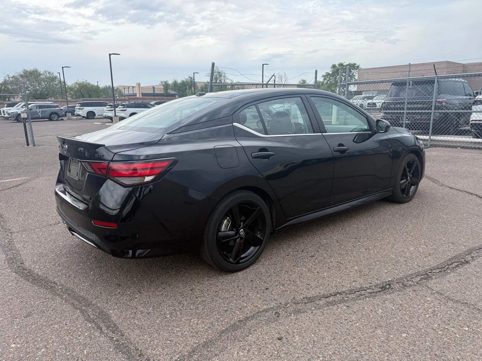 Used 2023 Super Black Nissan SR image 4
