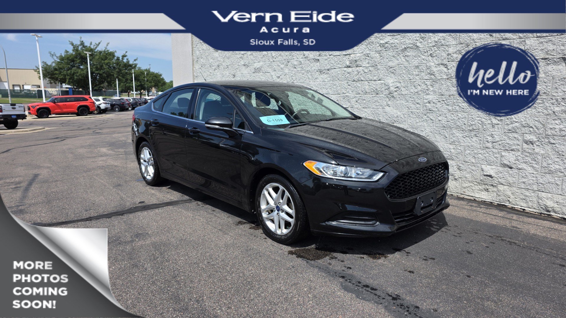 Used 2014 Tuxedo Black Metallic Ford SE image 1