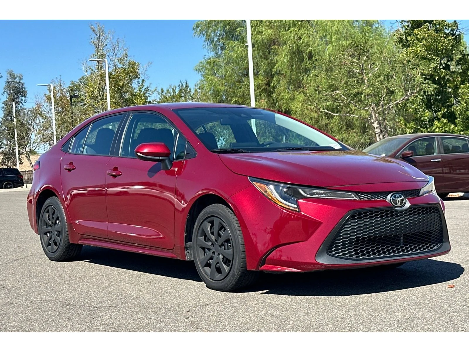 Used 2022 Ruby Flare Pearl Toyota LE image 6