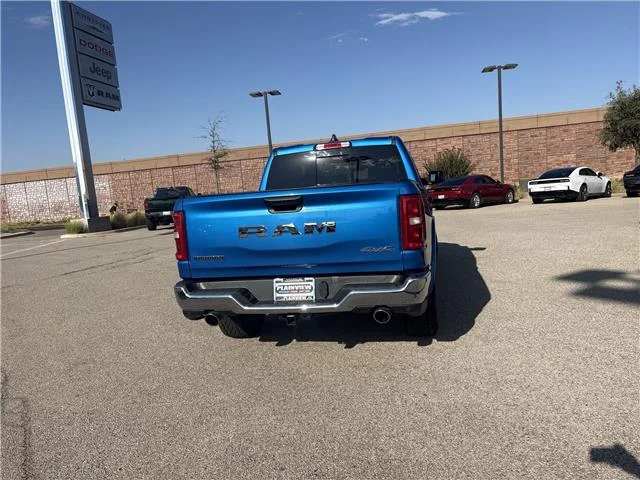 Used 2025 Hydro Blue Pearlcoat RAM Big Horn/Lone Star 4x4 Crew Cab 144.5 in. WB image 6