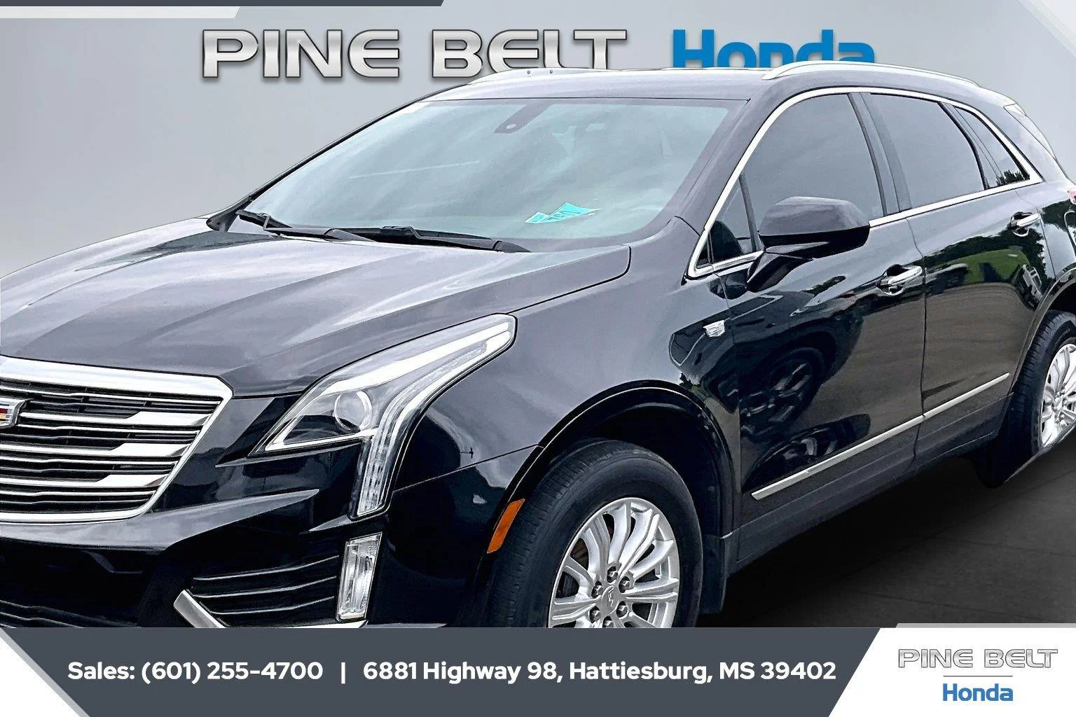 Used 2019 Stellar Black Metallic Cadillac FWD image 1