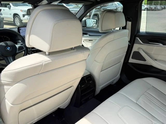 Used 2023 Black BMW M550i xDrive image 25