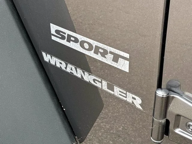 Used 2014 Granite Crystal Clearcoat Metallic Jeep Sport image 14