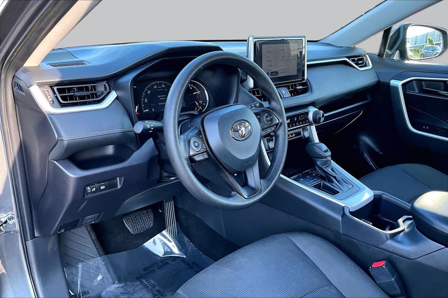 Used 2025 Magnetic Gray Metallic Toyota LE image 18