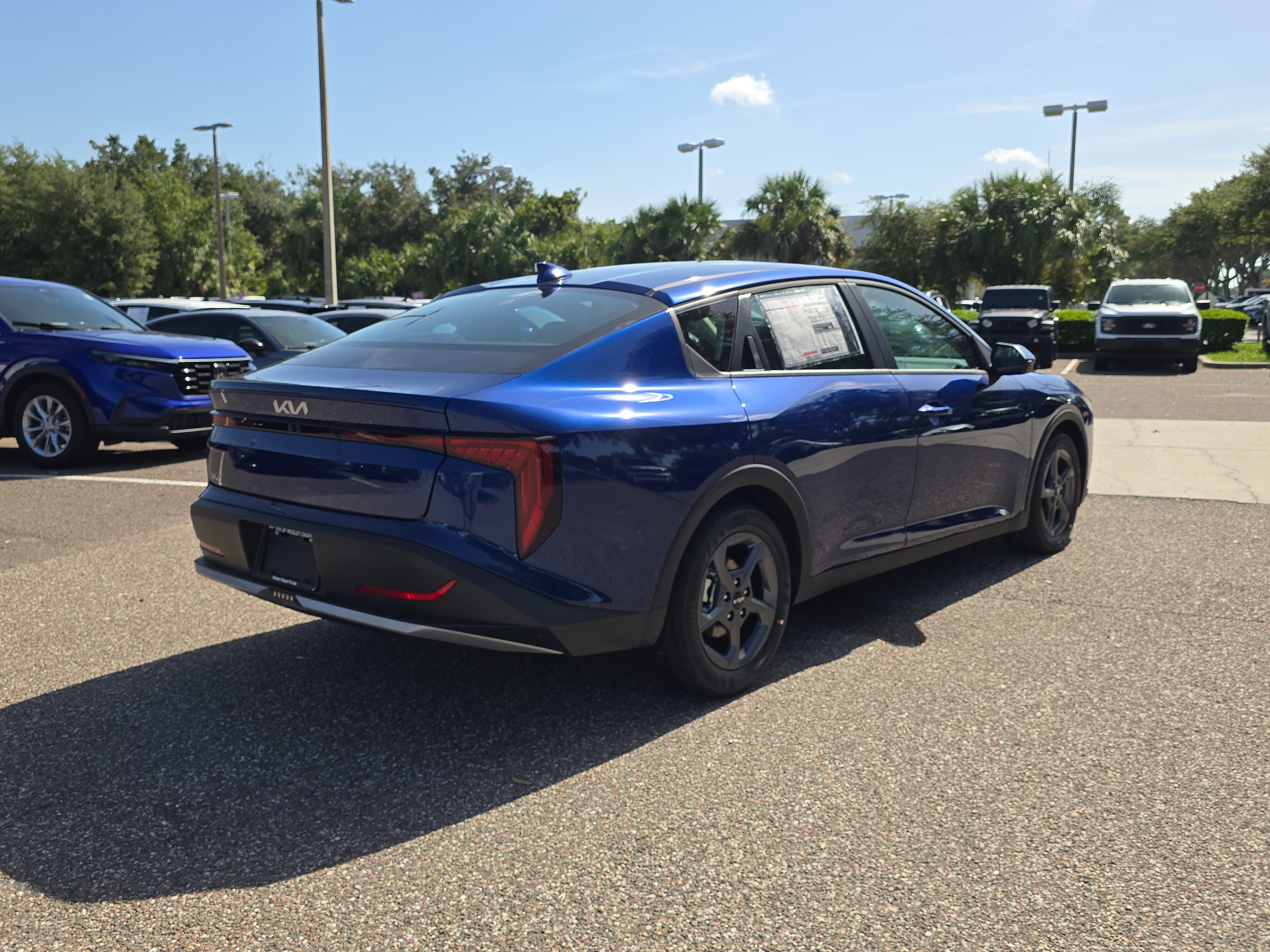 New 2026 Deep Sea Blue Kia LXS image 8