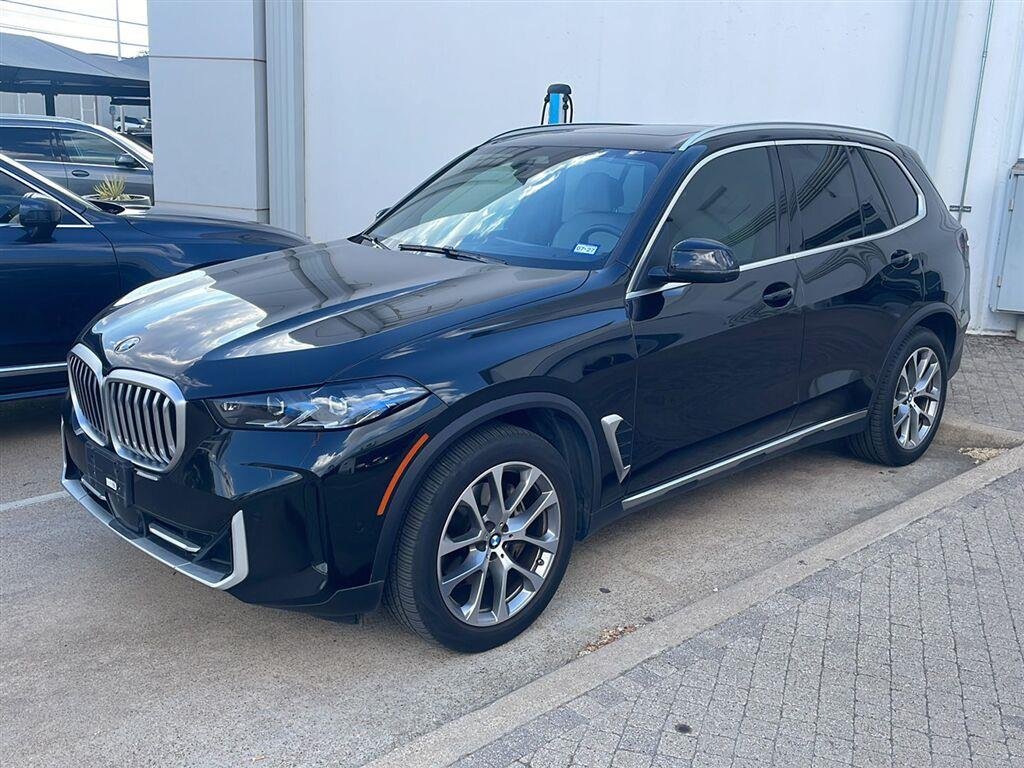 Used 2024 Black Sapphire Metallic BMW xDrive40i image 1
