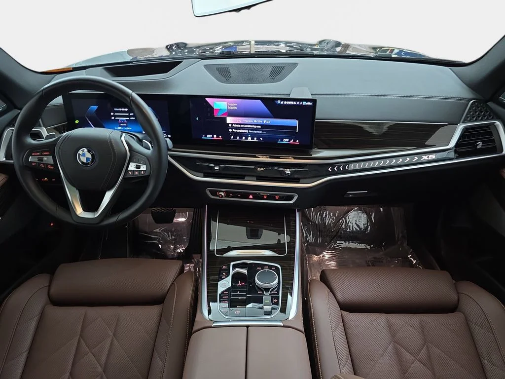 Used 2025 Black Sapphire Metallic BMW xDrive50e image 12