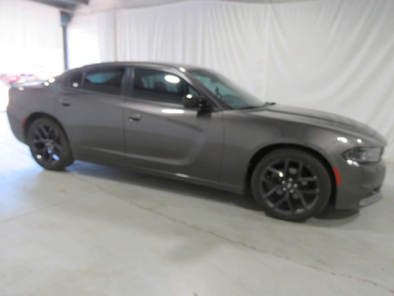Used 2021 Granite Crystal Metallic Clear Coat Dodge SXT image 7