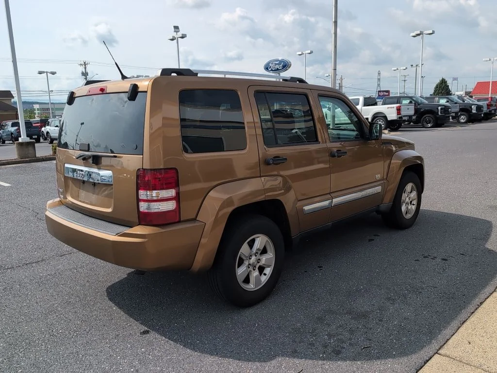 Used 2011 Brown Jeep Sport image 5