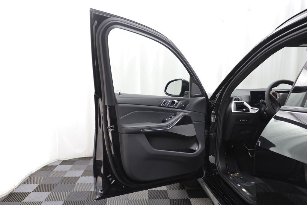 New 2026 Black Sapphire Metallic BMW xDrive50e image 2