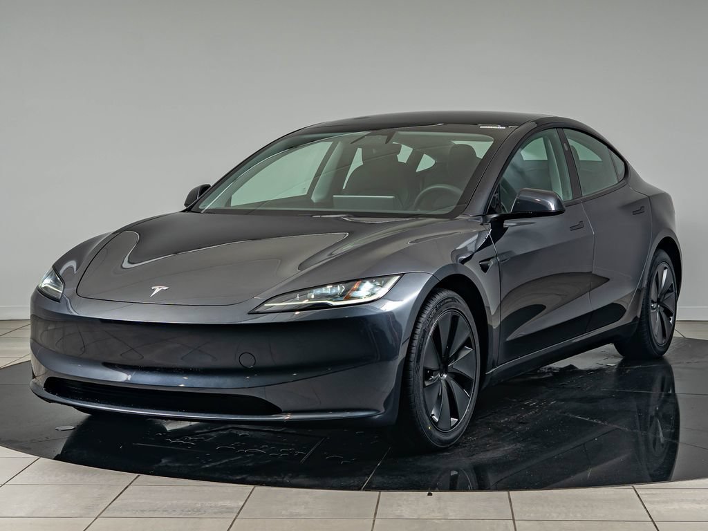 Used 2024 Stealth Gray Tesla  image 1