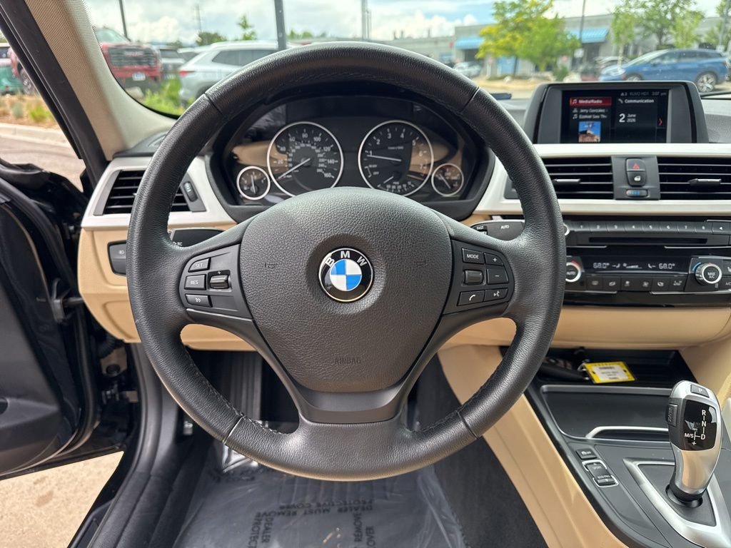 Used 2018 Black Sapphire Metallic BMW 320i xDrive image 14