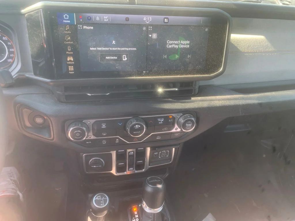 Used 2024 Granite Crystal Metallic Clearcoat Jeep Sport S image 14
