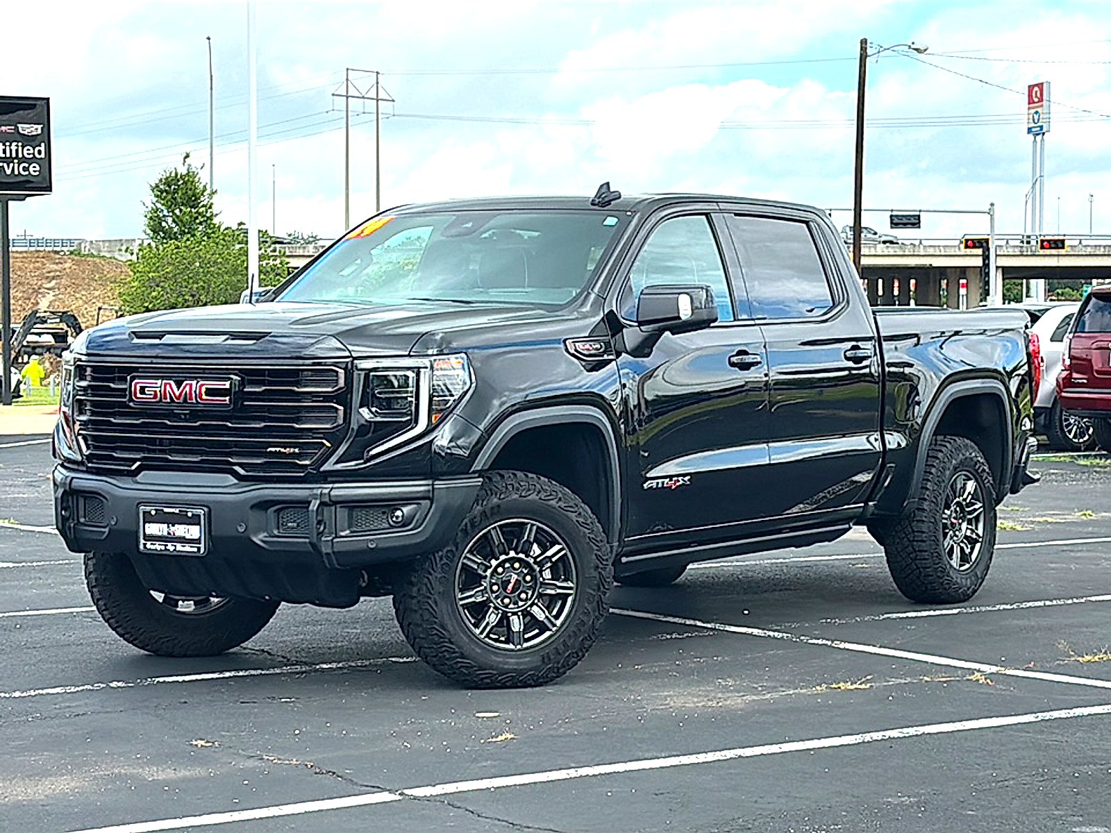 Used 2024 Onyx Black GMC AT4X image 2