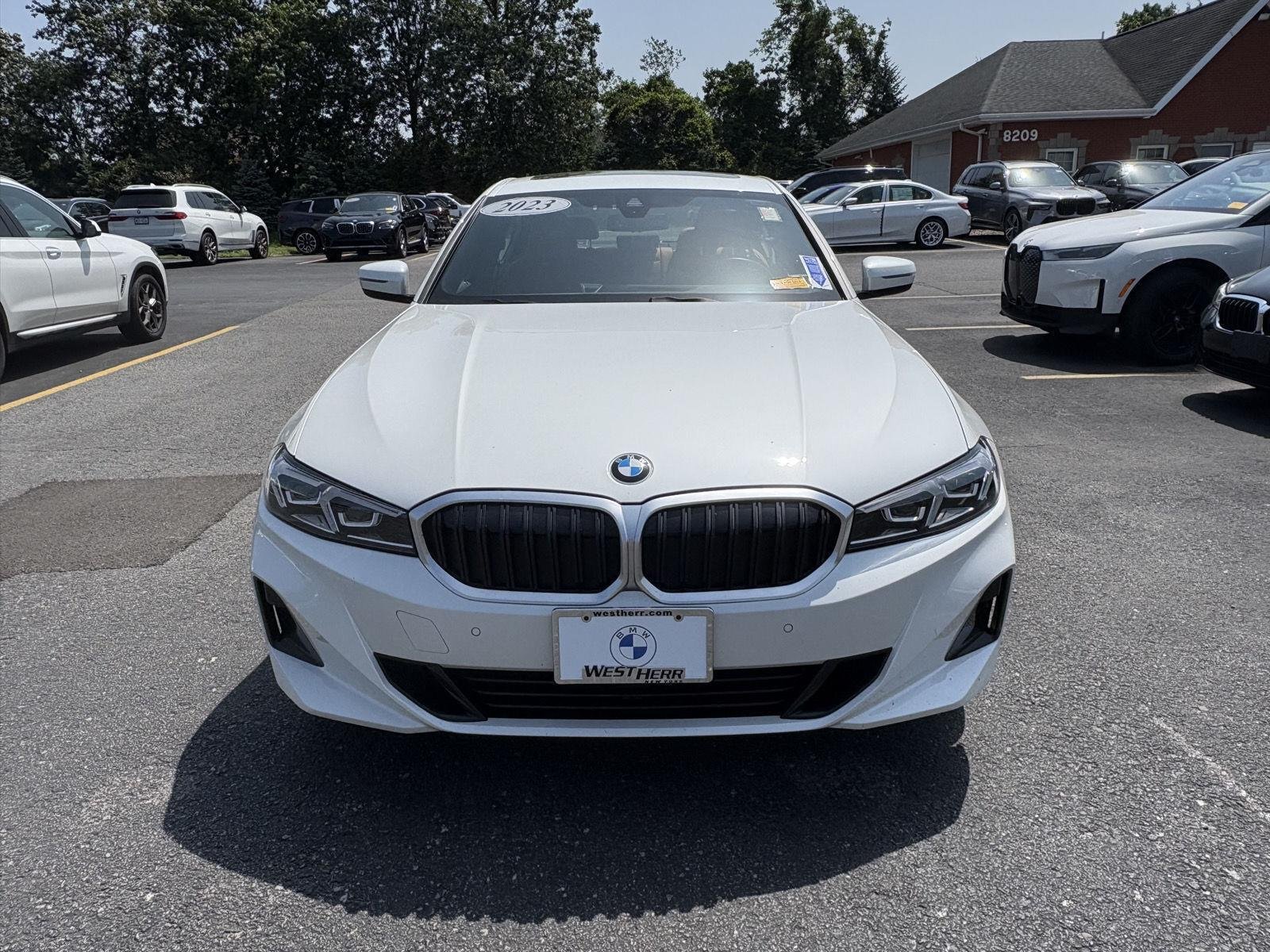 Used 2023 Mineral White Metallic BMW 330i xDrive image 2