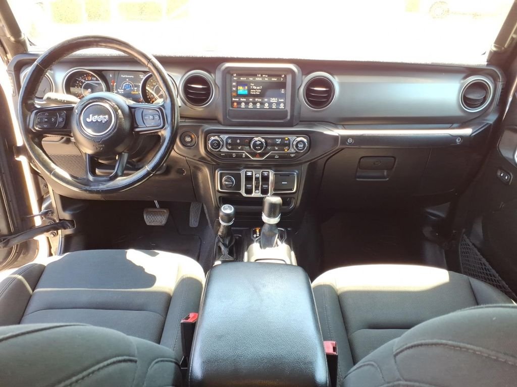 Used 2021 Crystal Metallic Jeep Sport image 4