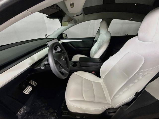 Used 2023 Solid Black Tesla Performance image 18