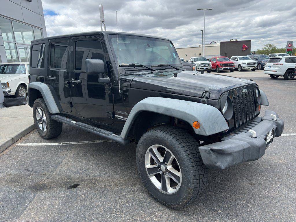 Used 2011 Black Clearcoat Jeep Sport image 7