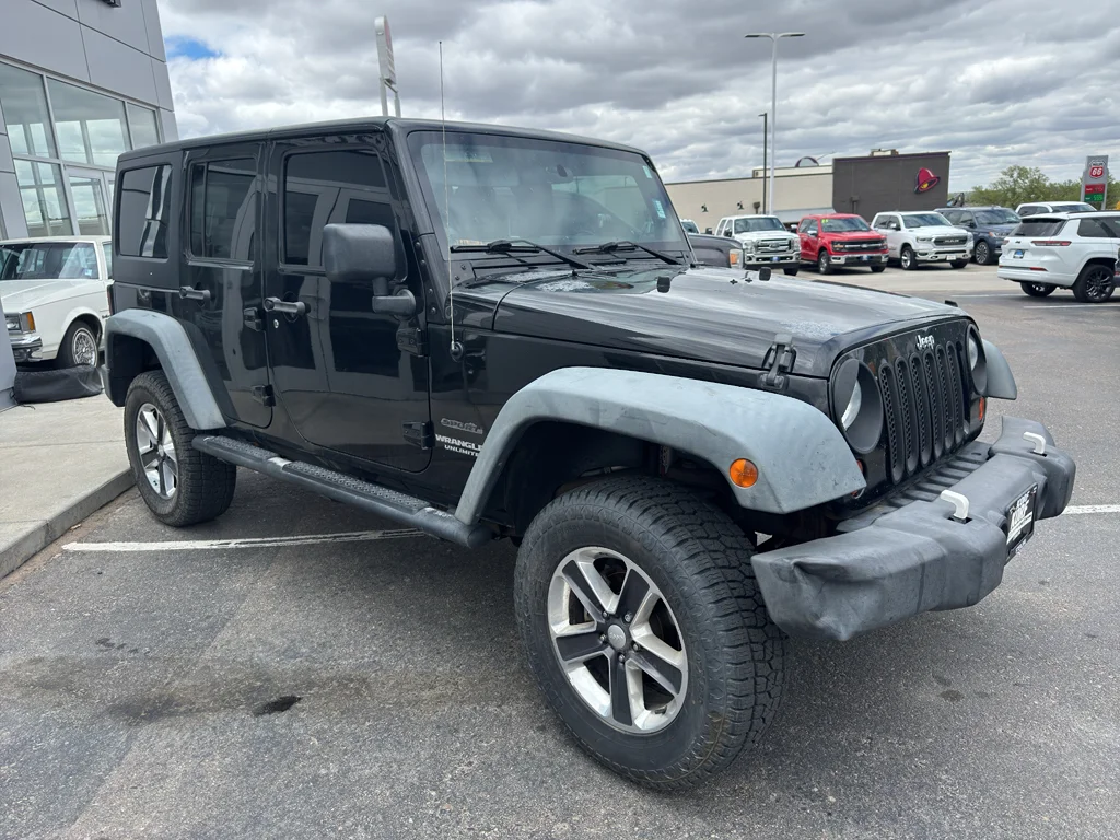 Used 2011 Black Clearcoat Jeep Sport image 7