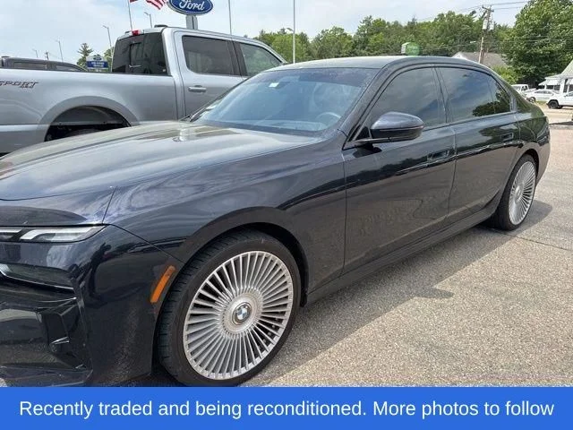 Used 2025 Carbon Black Metallic BMW 740i xDrive image 1