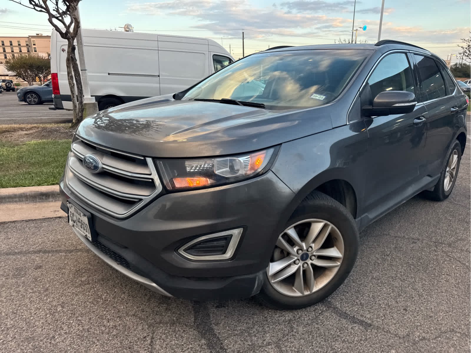 Used 2015 Magnetic Metallic Ford SEL image 2