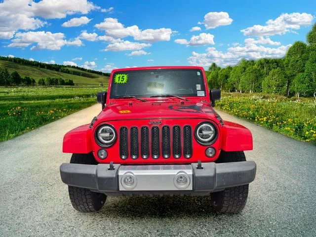 Used 2015 Red Jeep Unlimited Sahara image 8