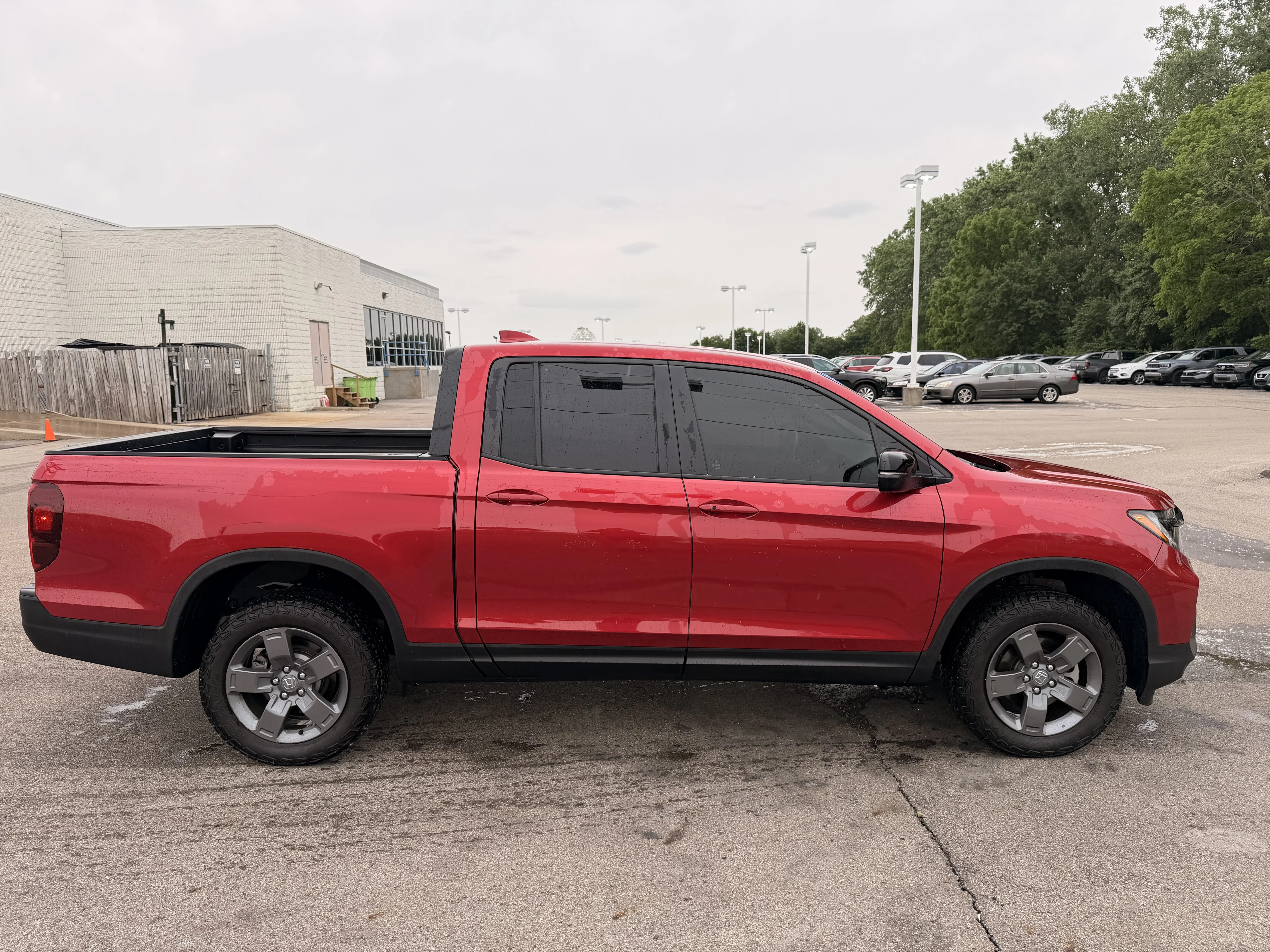 Certified Used 2025 Radiant Red Metallic II Honda TrailSport image 2