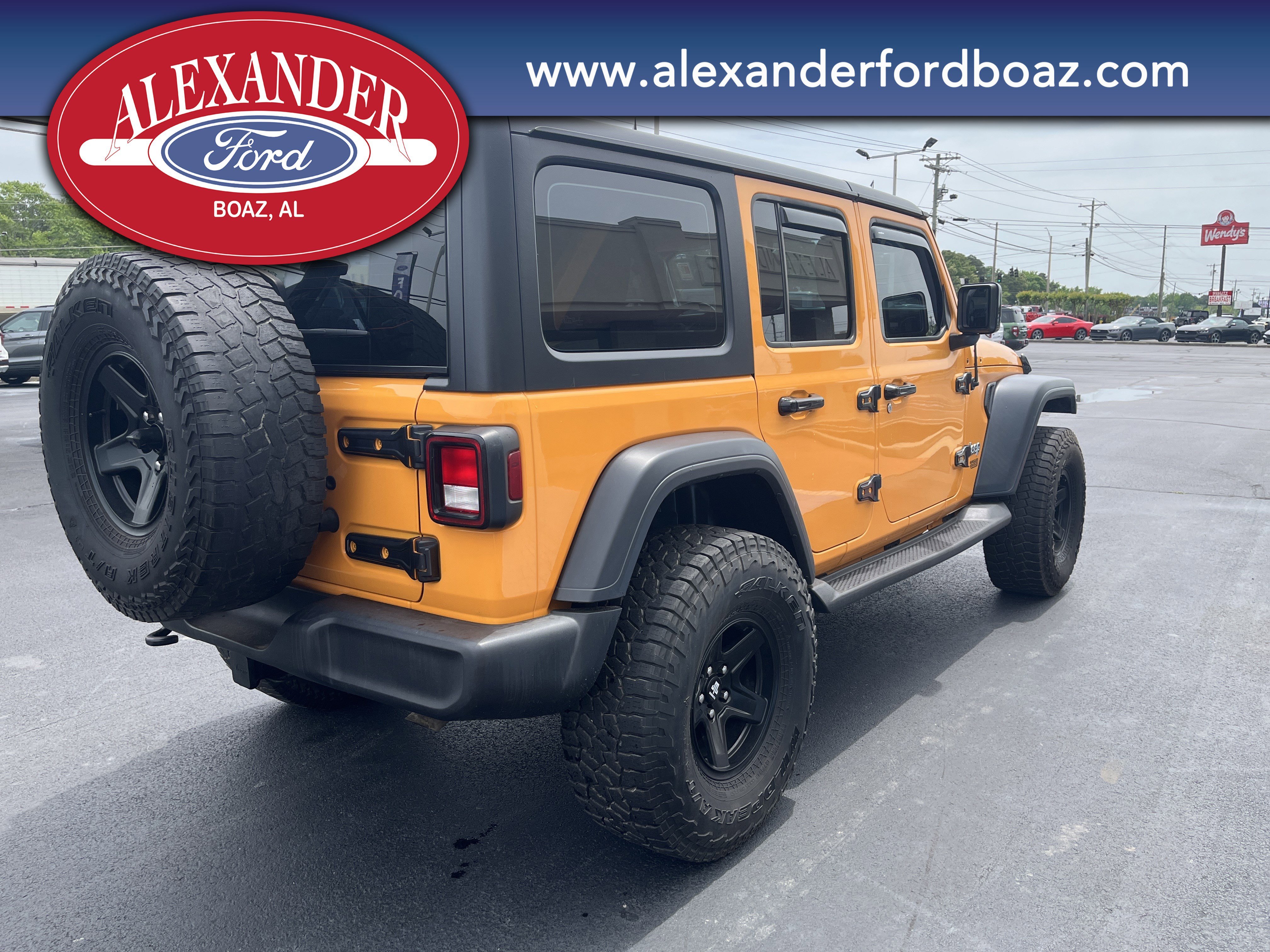 Used 2018 Orange Jeep Sport image 4